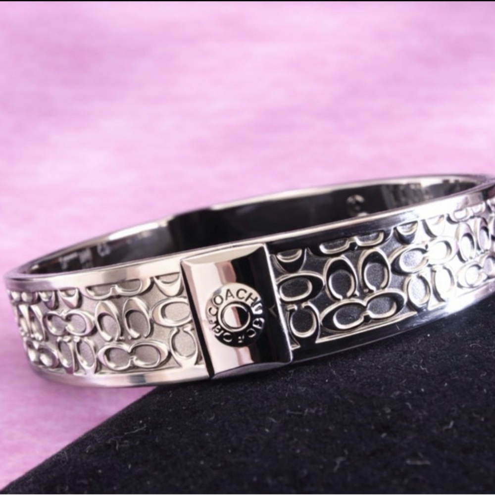 Quiet Luxury Silver Tone Cuff Bracelet with Intricate “C” Design - Picture 6 of 6